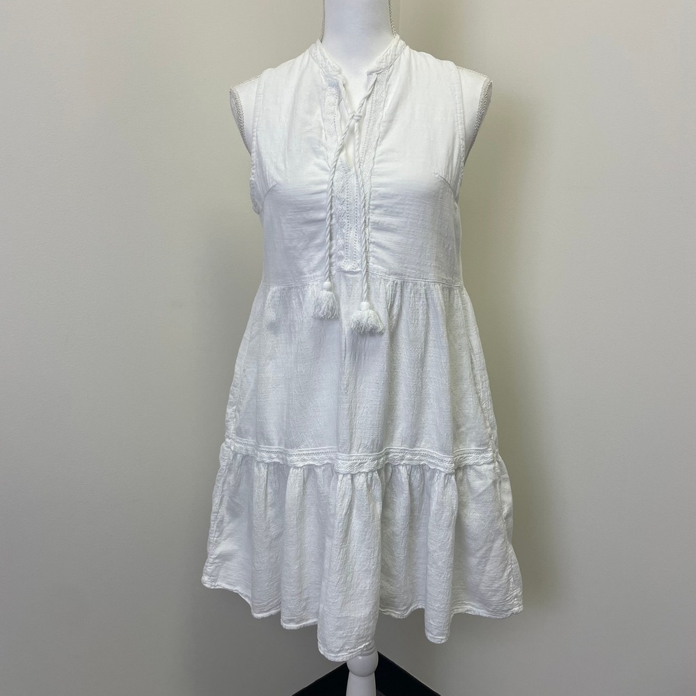 Sleeveless White Tiered Mini Dress with Tassel Tie